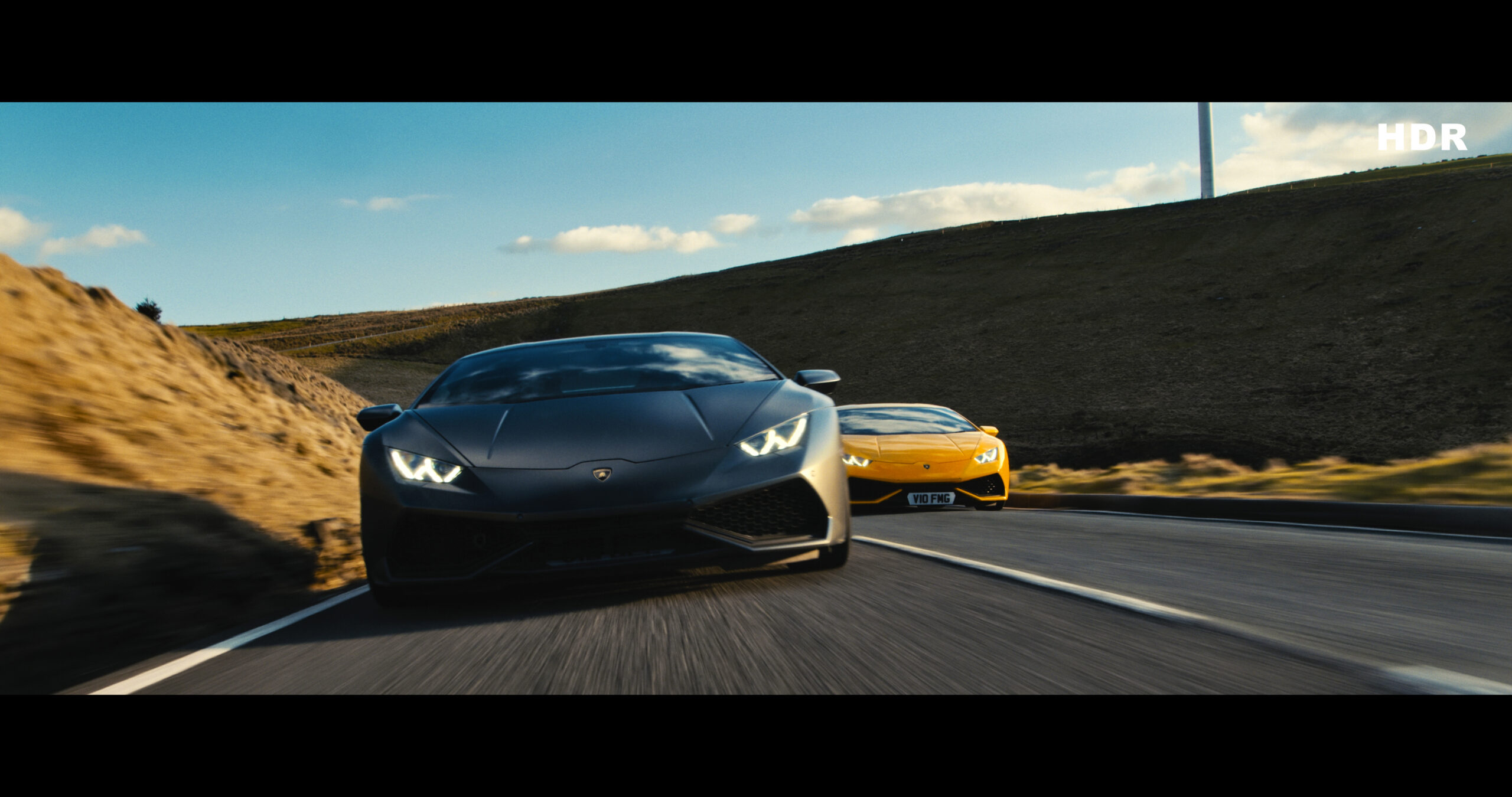 Two Lambourghinis racing